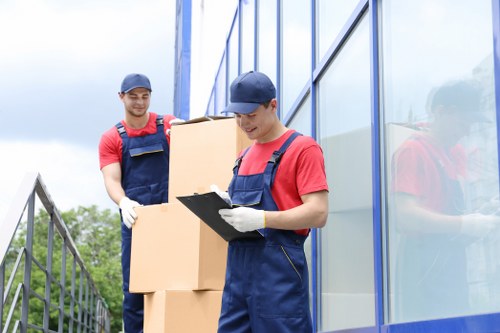 Removals team beginning a careful move in West Hampstead