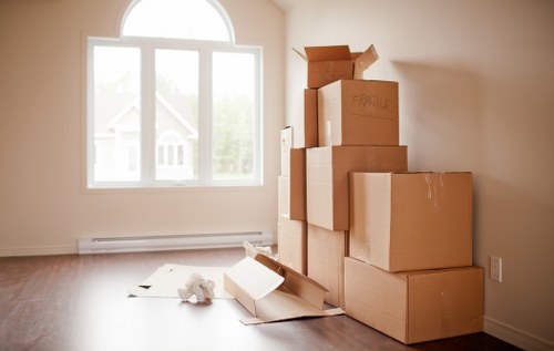 Local removal team handling boxes and furniture in Westhampstead