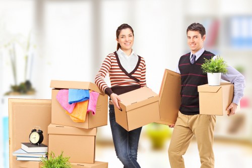 Careful handling of fragile household items by packing experts in Westhampstead