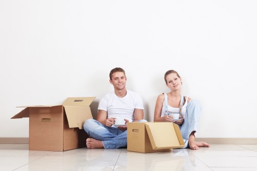 Professional team handling furniture pick-up in a Westhampstead flat