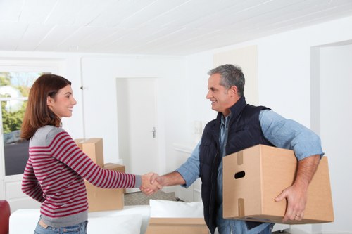 Neatly packed removal boxes with wrapping materials for West Hampstead moves