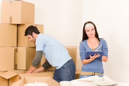 Local office moving team in Westhampstead handling furniture