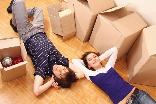 Packed moving boxes and furniture ready for transport