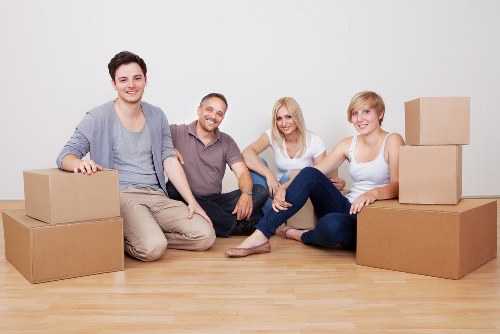 Professional movers handling goods during a relocation