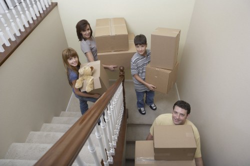 Apartment relocation logistics in West Hampstead with packing materials